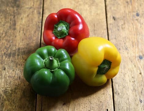 Red, yellow, and green bell pepper strips